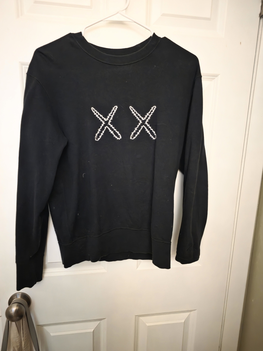 Uniqlo x KAWS Black Crew Sweatshirt with White XX Embroidery